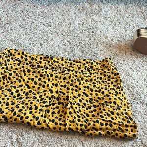 Yellow skirt. 100% Vicose. Worn, but no rips or tears.